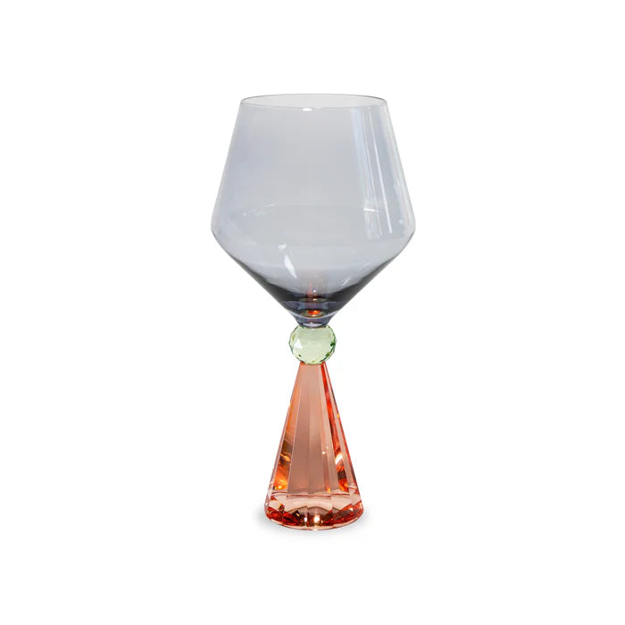 Calice per gin tonic in vetro con base effetto diamante. Colore pesca e grigio.