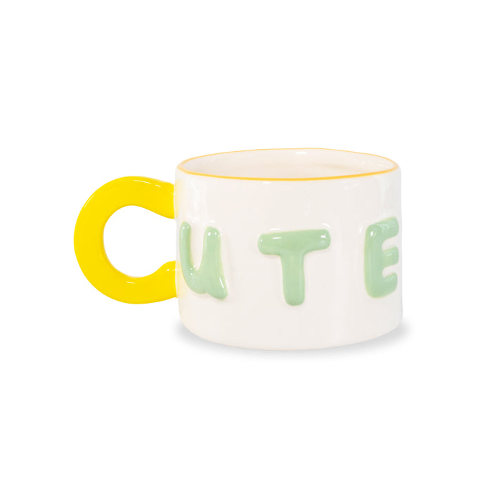 Tazza colazione in stoneware. Capacità 440 ml. Decoro cute.