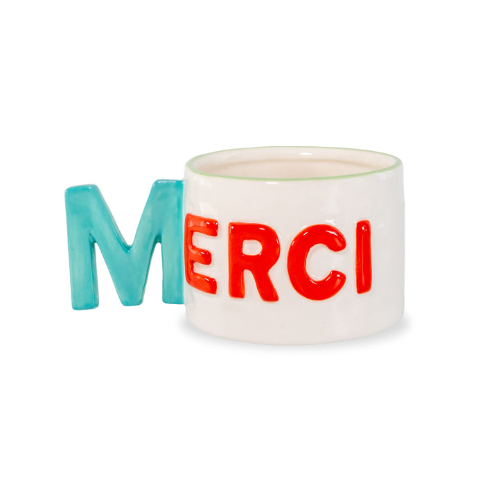 Tazza colazione in stoneware. Capacità 440 ml. Decoro merci.